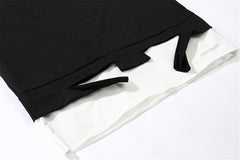 Alexis β Oversized Unisex Ribbons T-Shirt