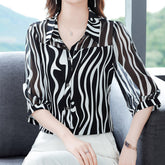 Livia β Striped Womenβs Summer Top